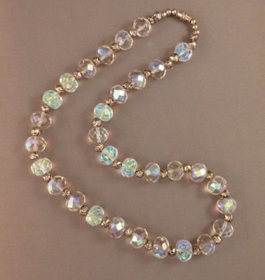 Aurora borealis crystal B
Rethreaded, unusual flattened beads
