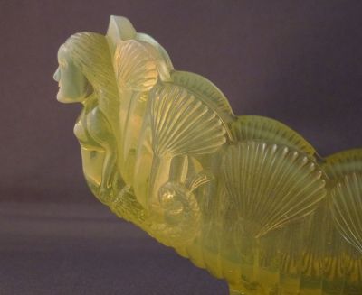 Burtles and Tate canoe
Mermaid with two tails
Keywords: vase;pressed;british