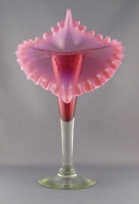 Cranberry and uranium Jack in the Pulpit vase
Opalescent rim. Likely English
Keywords: blown;british;vase