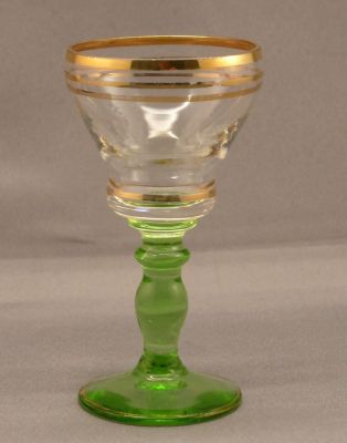 Green and gilded liqueur glass
8 cm tall
Keywords: blown;czech;enamelgilt