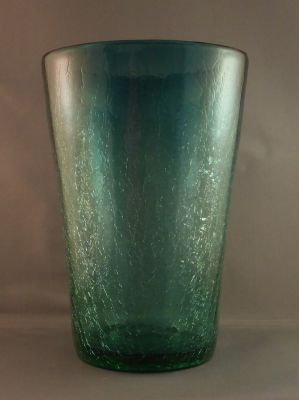Teal blue crackle bucket vase
Lead crystal, so likely English and possibly Stevens and Williams. Lovely ombre effect. 8 x 5.5 in.
Keywords: blown;british;vase