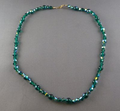 Aurora borealis aqua green beads
Restrung
