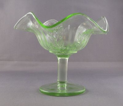 Fenton Holly 231 compote, Green Transparent
1932-36. Made in carnival earlier
Keywords: american;pressed;table
