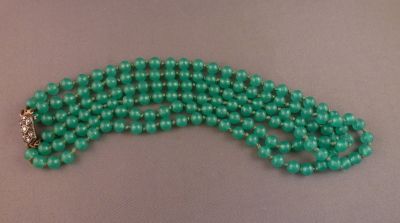 Blue-green uranium necklace
Three string choker style. Marcasite clasp
Keywords: uranium;sold