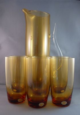Krosno amber water set
1970s made by Krośnieńskie Huty Szkła (marked box), the nationalised company. Apparently purchased from Marks & Spencer
Keywords: barware;blown;sold