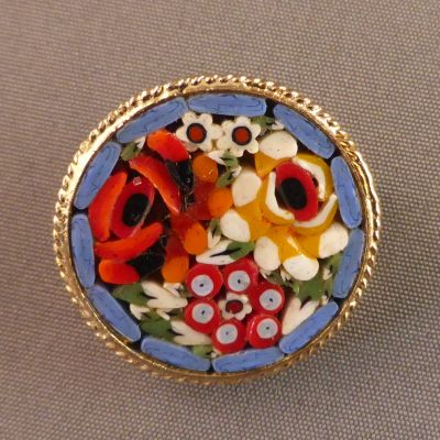 Brooch, micromosaic
1 in diameter.
