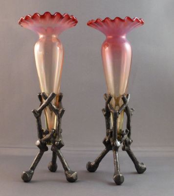 Pink opalescent with uranium stand vase
White metal frames
Keywords: blown;british;vase