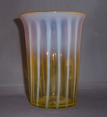 Webb? amber uranium opalescent stripe vase
Star cut and flat polished base. 16 ribs
Keywords: british;blown;vase