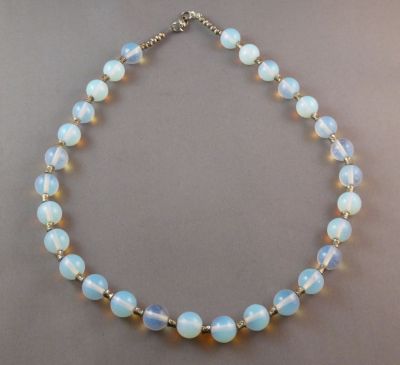 Opalescent necklace
Modern with metal beads
