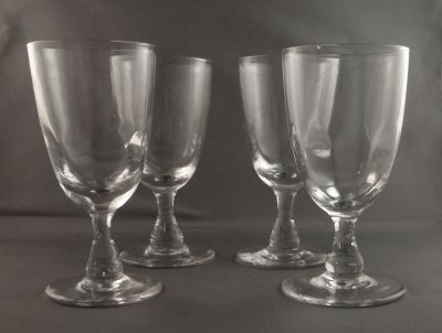 Optic panel wine glass
Fire-polished rims and shear marks on base. British?
Keywords: british;sold;barware