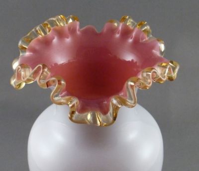 Opal glass vase, pink inner
Crimped and frilled rim
Keywords: blown;vase;sold