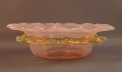 Pink and uranium preserve dish
Opalescent pink with uranium frill and polished pontil mark. English
Keywords: blown;british;table
