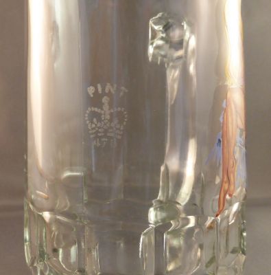 Ravenhead nude pint mug
Ravenhead St Helens pint mark. The Ravenhead Glass Company used this stamp number from 1972 to 1996 before the company changed to the weights and measures authority in Bury 
Keywords: barware;enamelgilt;sold;mark;british