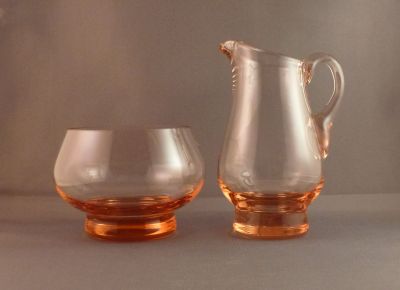 Romanian peach creamer/milk jug and sugar
Polished pontil mark on jug; ground and polished rim on bowl
Keywords: blown;sold