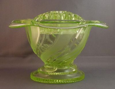 Sowerby T.2624 rose bowl 
Flower holder is the same as the 2570 and the coggy foot appears on the Dora vase
Keywords: british;pressed;vase