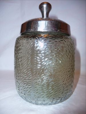 Silvered mould-blown jar
Unknown. Heavy planished lid
Keywords: sold;blown;table