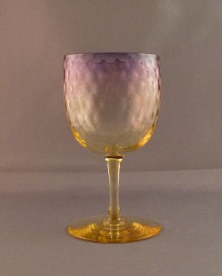 Webb Alexandrite honeycomb wine glass
A rare reheat effect with shading from yellow through fuschia pink to blue
Keywords: barware;blown;british